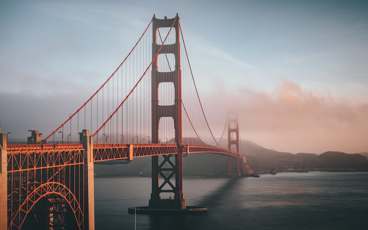 Golden Gate Bridge as seen from a slight distance during sunset